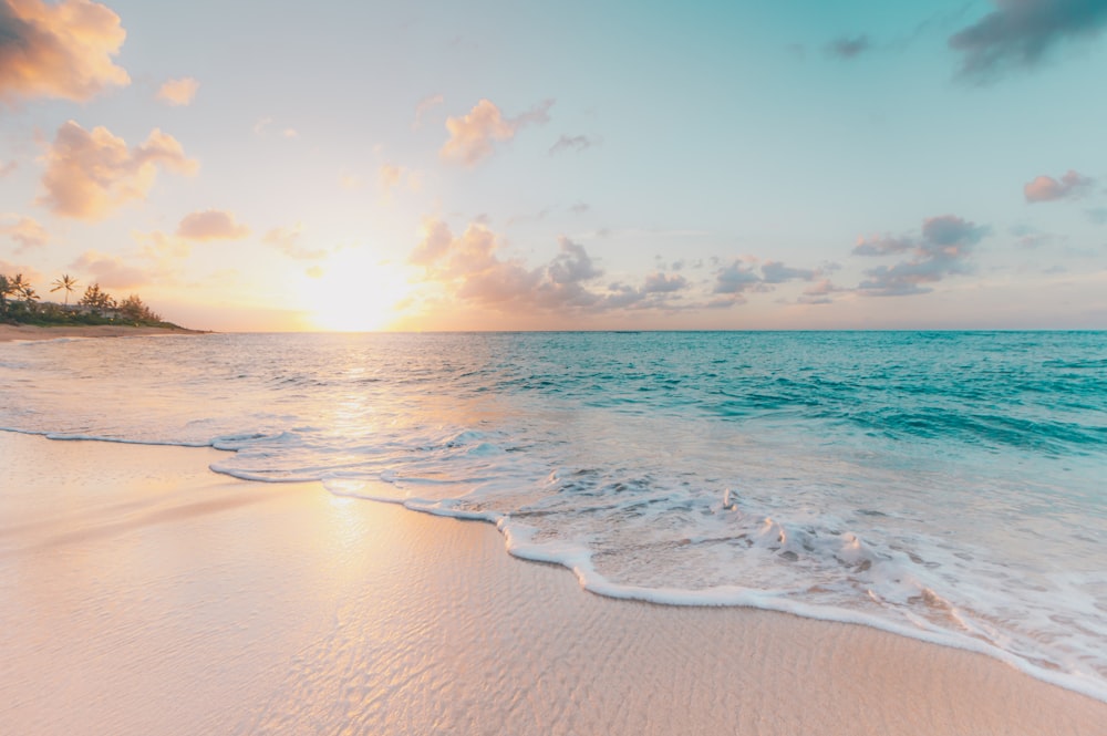 Sunrise over a calm tropical beach